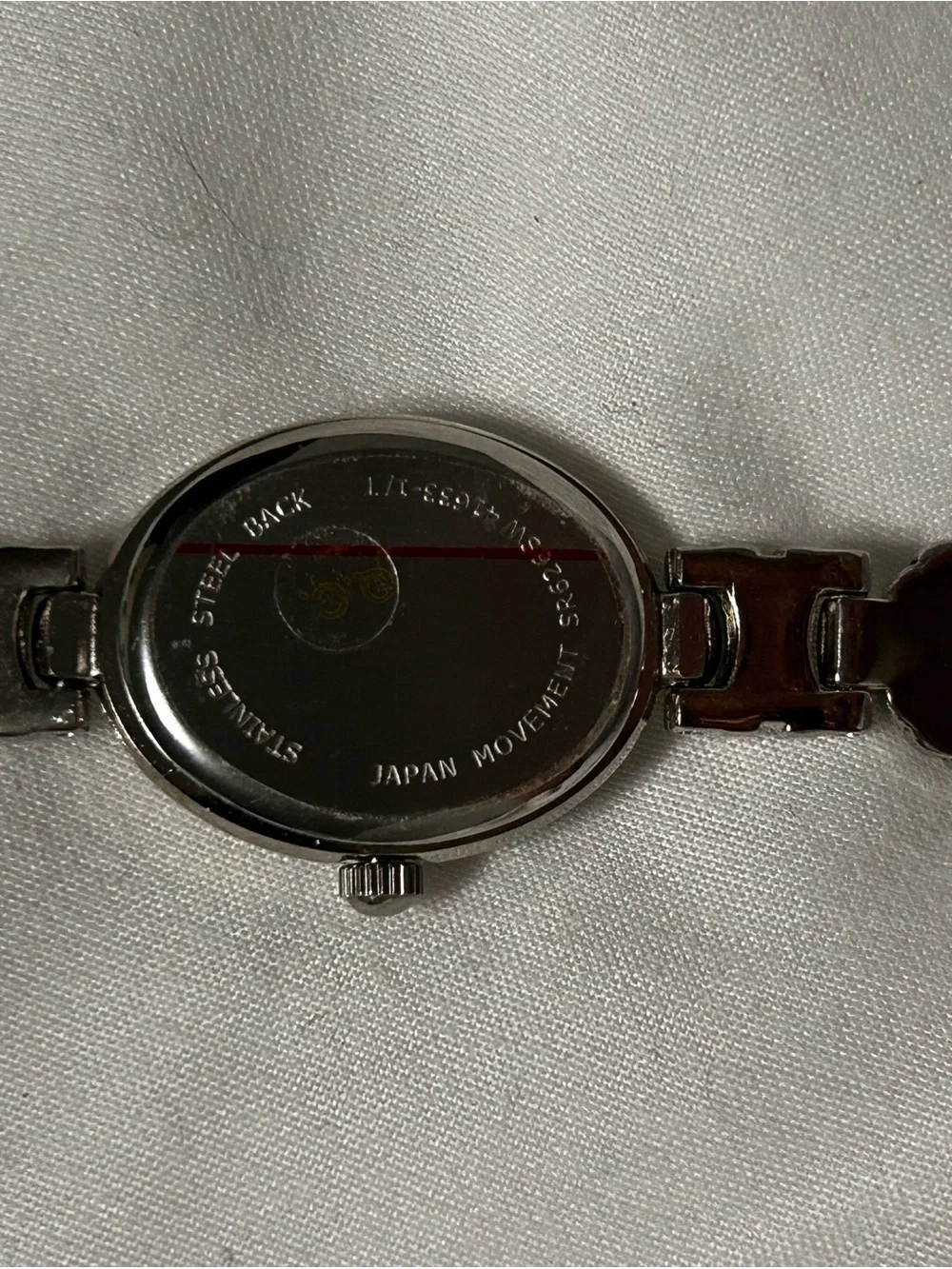 Silver Oval Bracelet Watch with Decorative Links